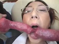Dick hungry oriental legal age teenager slurping on 2 big dog weenies
